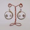 Pendientes redondos con doble espiral interior plateados 10 Pendientes redondos con doble espiral interior plateados