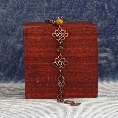 Pulsera de cobre hecha a mano con ojo de tigre natural