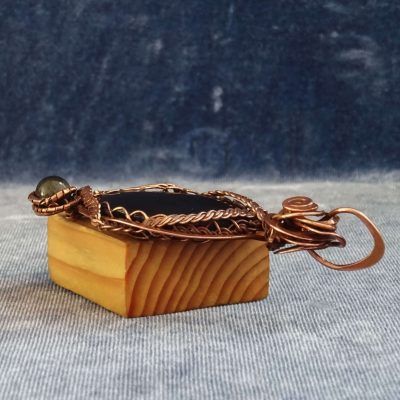 Colgante de cobre con obsidiana